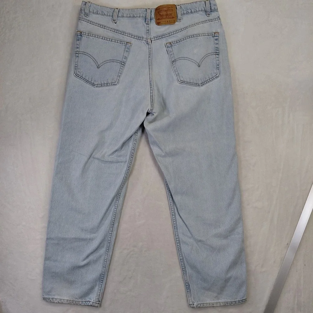 Vintage Levis 550 Relaxed Fit Light Wash Jeans Mens 40x30 Made in USA Blue